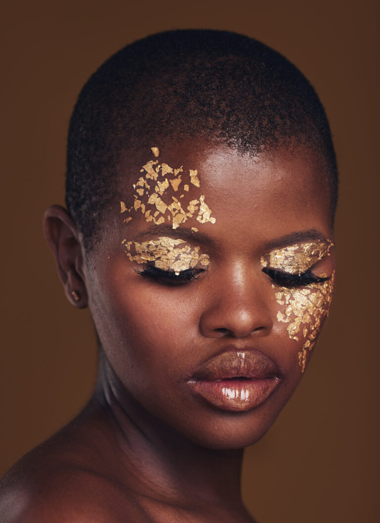 gold-flakes-beauty-and-black-woman-with-face-clos-2026-03-25-03-46-43-utc